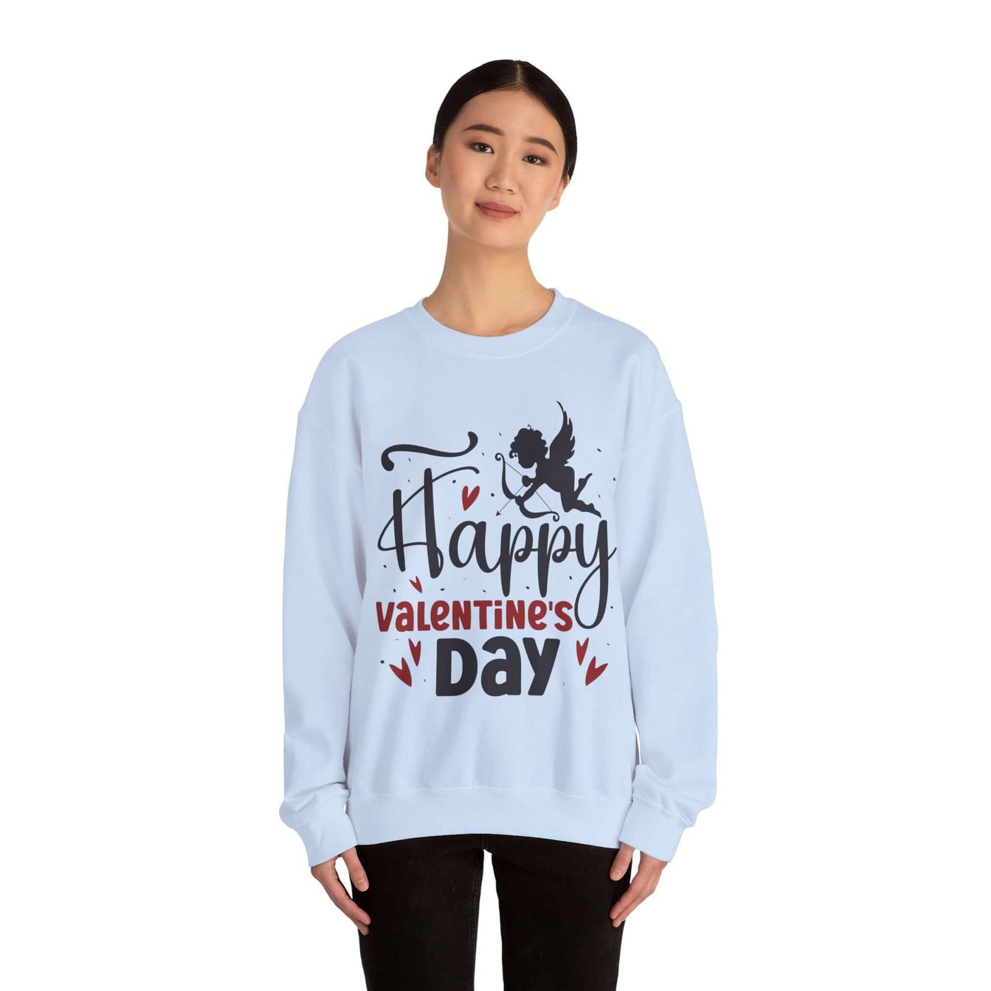 Woman wearing Valentine's Day sweatshirt with 'Happy Valentine's Day' and cupid graphic. Ideal for romantic Valentine's celebrations.