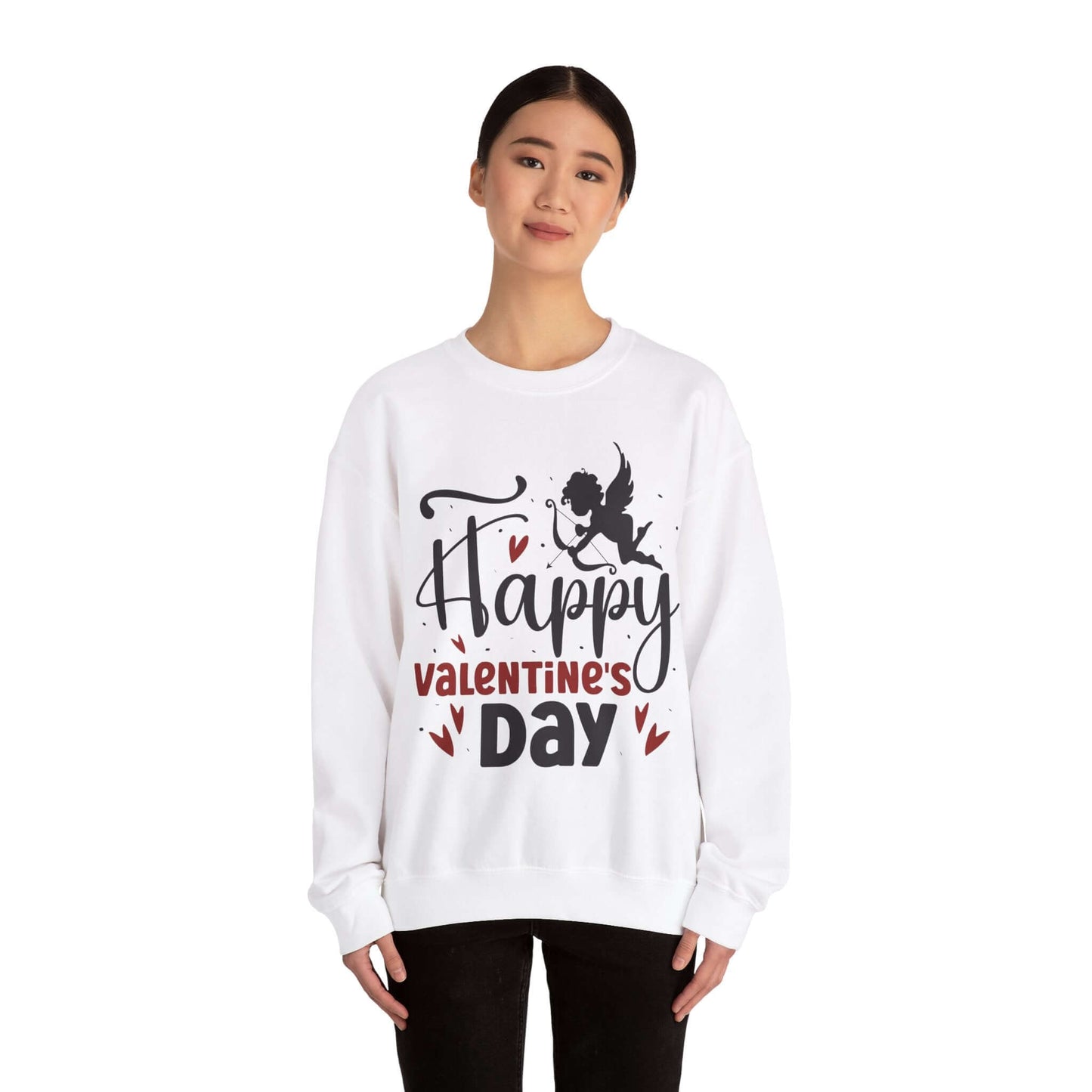 Woman wearing a white Valentine's Day sweatshirt with 'Happy Valentine's Day' text and cupid graphic, celebrating love.