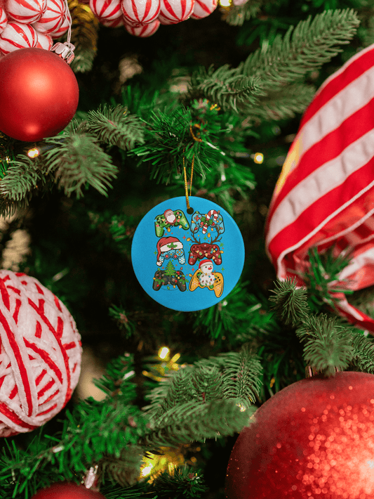 Colorful round ornament featuring playful holiday designs, hanging on a decorated Christmas tree.