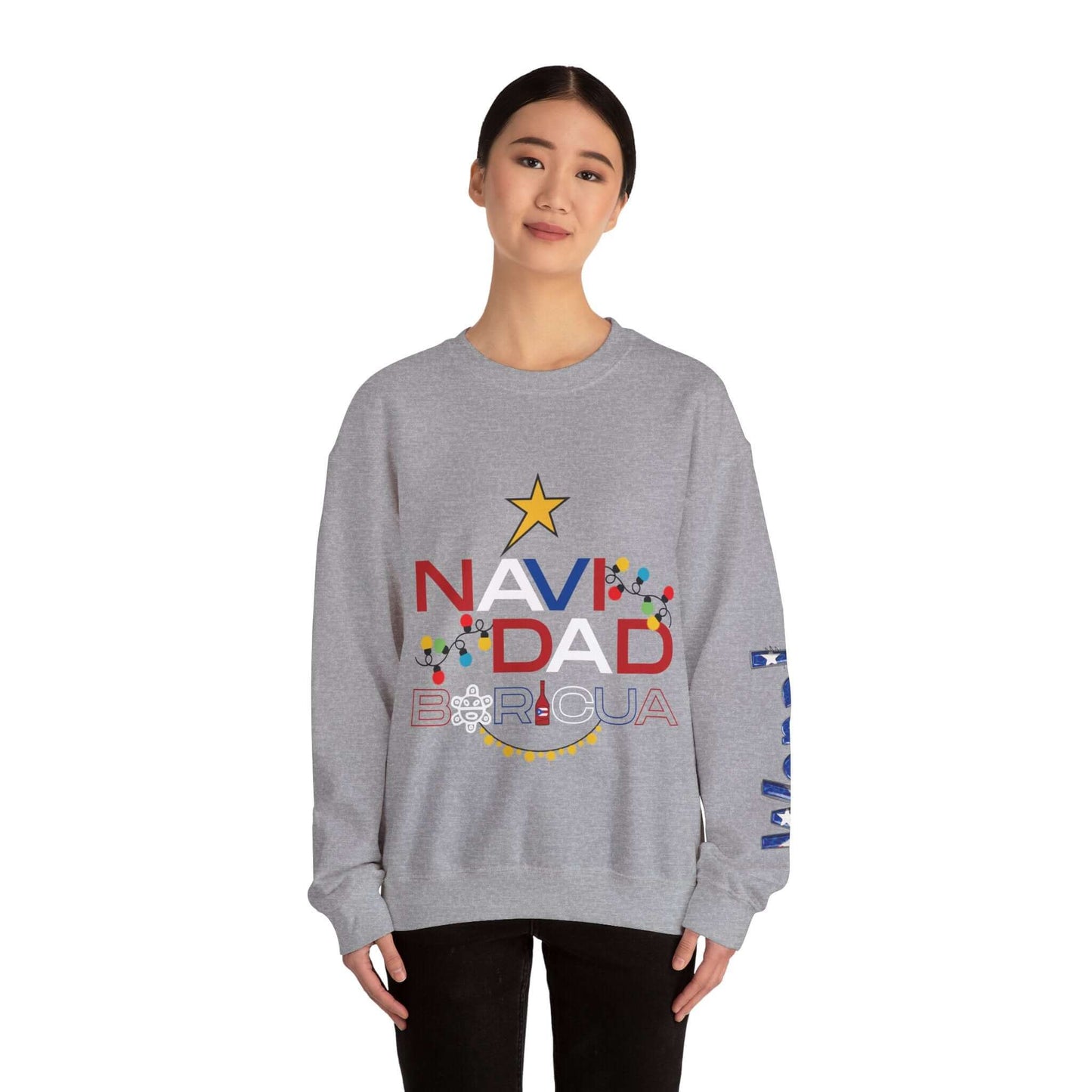 Woman wearing a gray Navidad Boricua Christmas sweater with festive designs and left sleeve print.