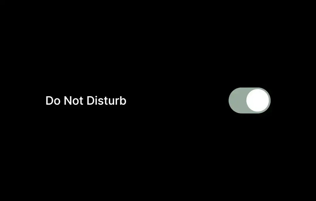 "Do Not Disturb toggle switch on black background"