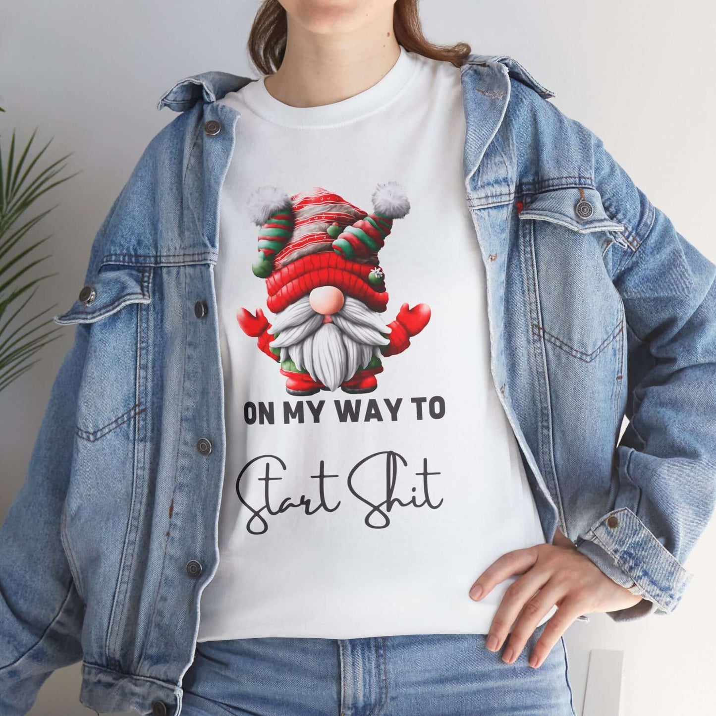 Festive-themed t-shirt with a Santa Claus dressed gnome graphic and humorously the text "On my way Start Shit" at the bottom