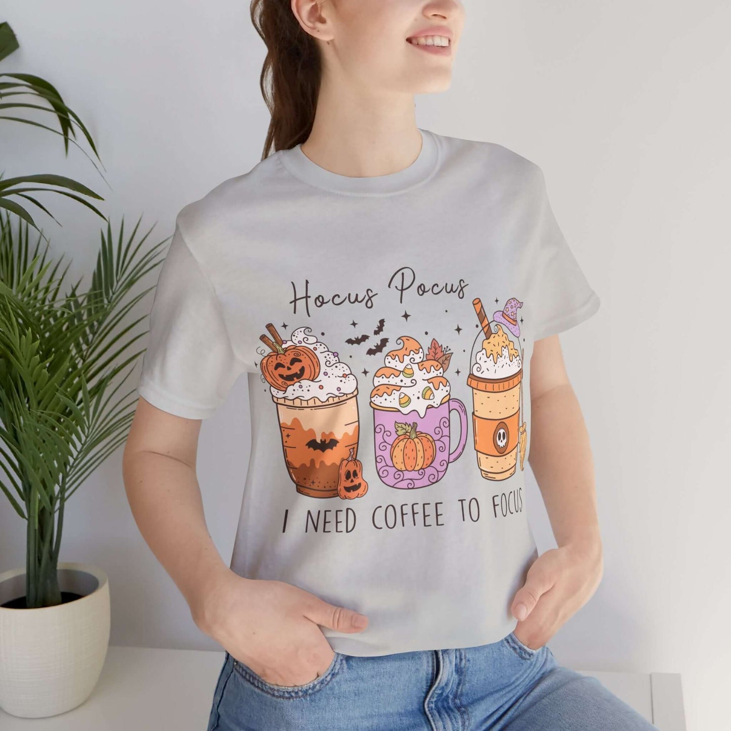 Halloween Coffee Lover's T-shirt, Hocus Pocus I Need Coffee to Focus, Women's Spooky Shirt for Brew-Witching Mornings and Halloween Parties.