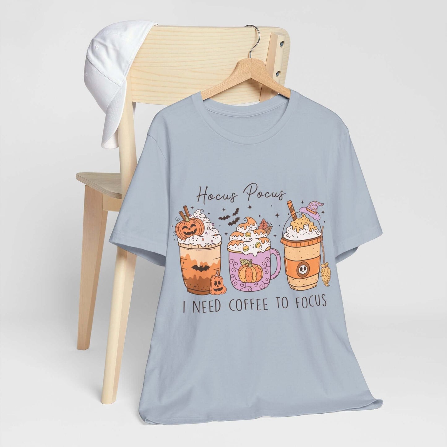 Halloween Coffee Lover's T-shirt, Hocus Pocus I Need Coffee to Focus, Women's Spooky Shirt for Brew-Witching Mornings and Halloween Parties.