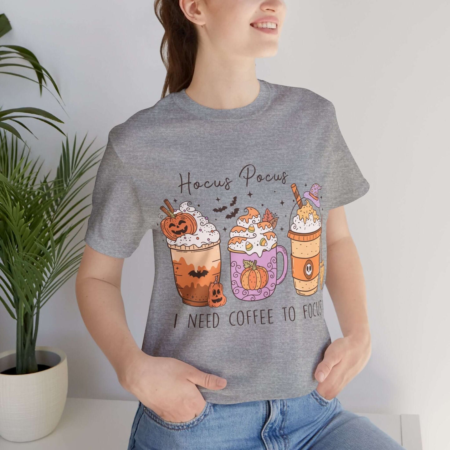 Halloween Coffee Lover's T-shirt, Hocus Pocus I Need Coffee to Focus, Women's Spooky Shirt for Brew-Witching Mornings and Halloween Parties.