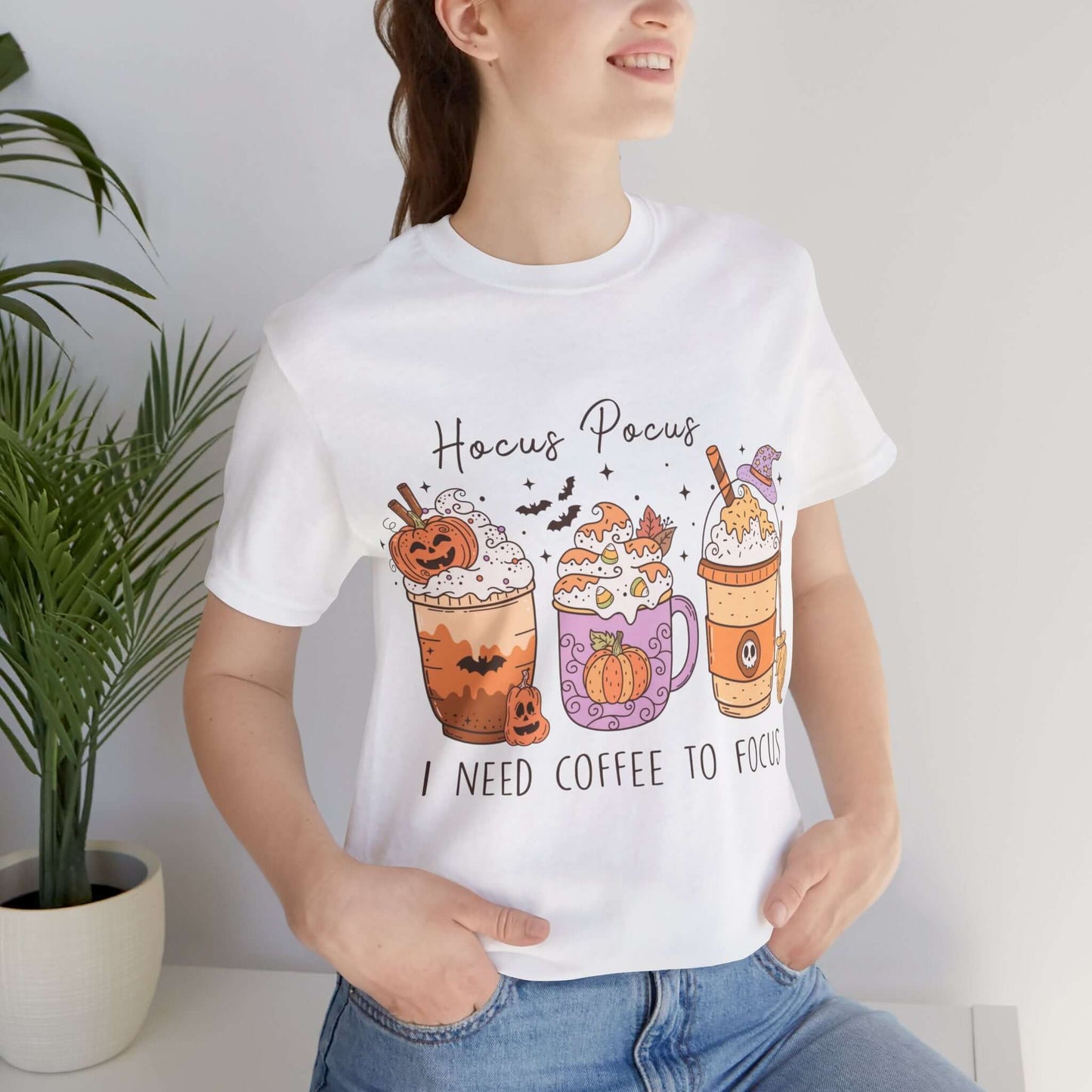 Halloween Coffee Lover's T-shirt, Hocus Pocus I Need Coffee to Focus, Women's Spooky Shirt for Brew-Witching Mornings and Halloween Parties.