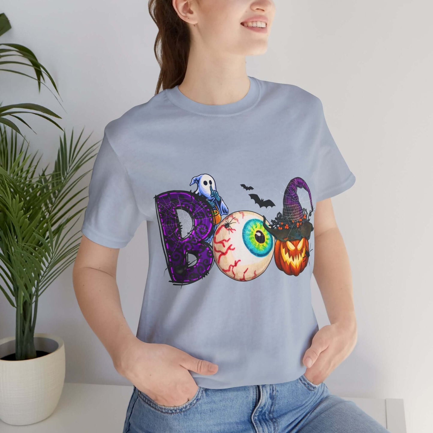 Halloween 'Boo' Women's T-shirt, Spooky Eyeball and Pumpkin Design, Cartoon Scary Tee for Unique Halloween Outfits and Fun Trick-or-Treating