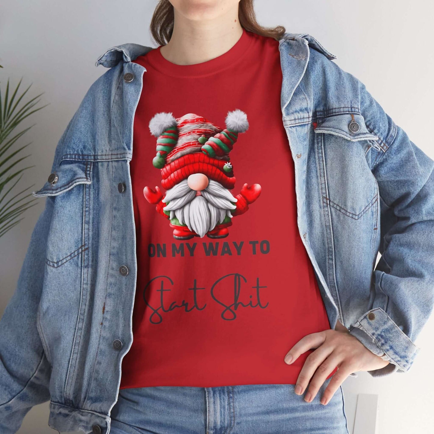 Festive-themed t-shirt with a Santa Claus dressed gnome graphic and humorously the text "On my way Start Shit" at the bottom