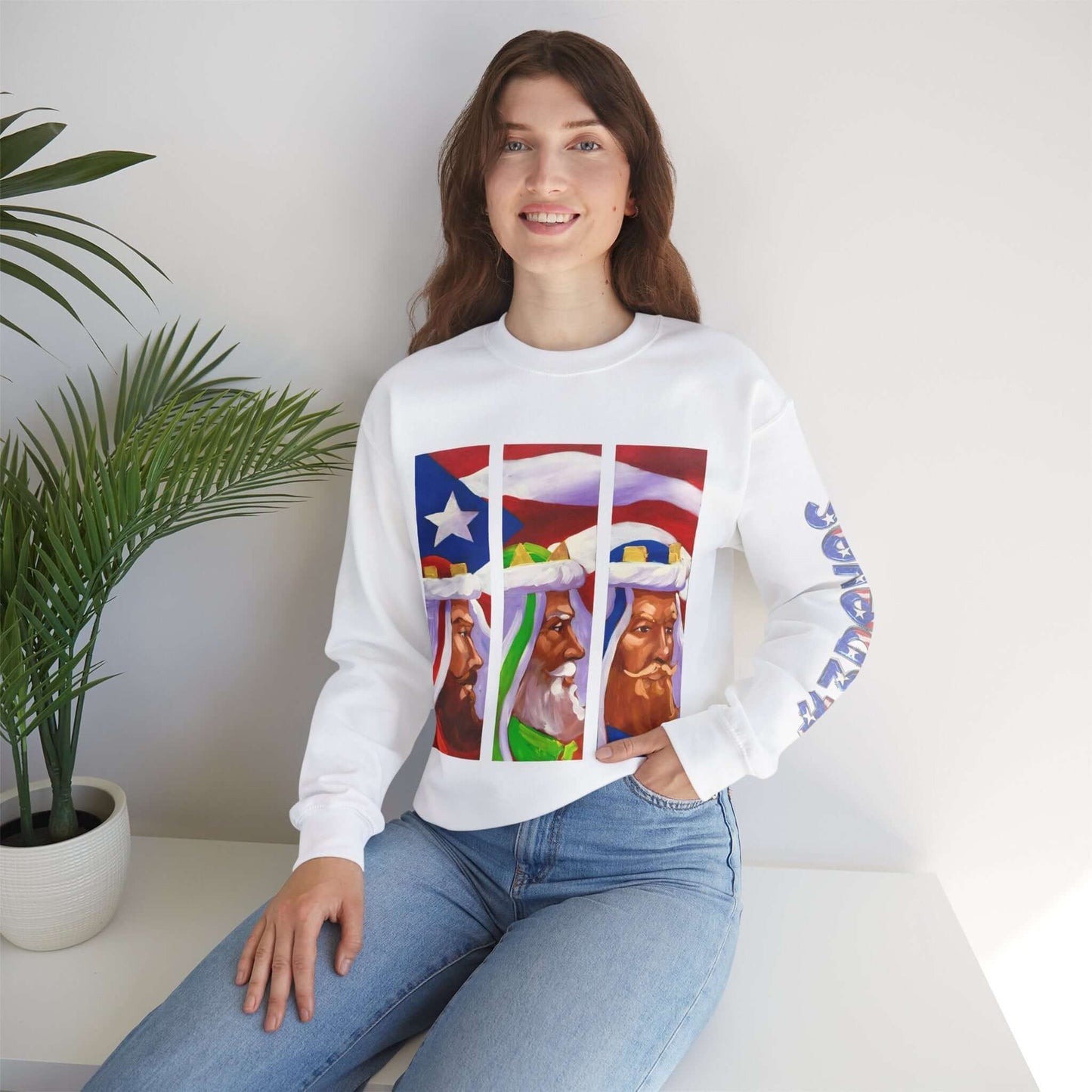 Woman wearing Festive Three Kings Holiday Sweater with Puerto Rican flag design, showcasing Three Kings art on cream-colored fabric.