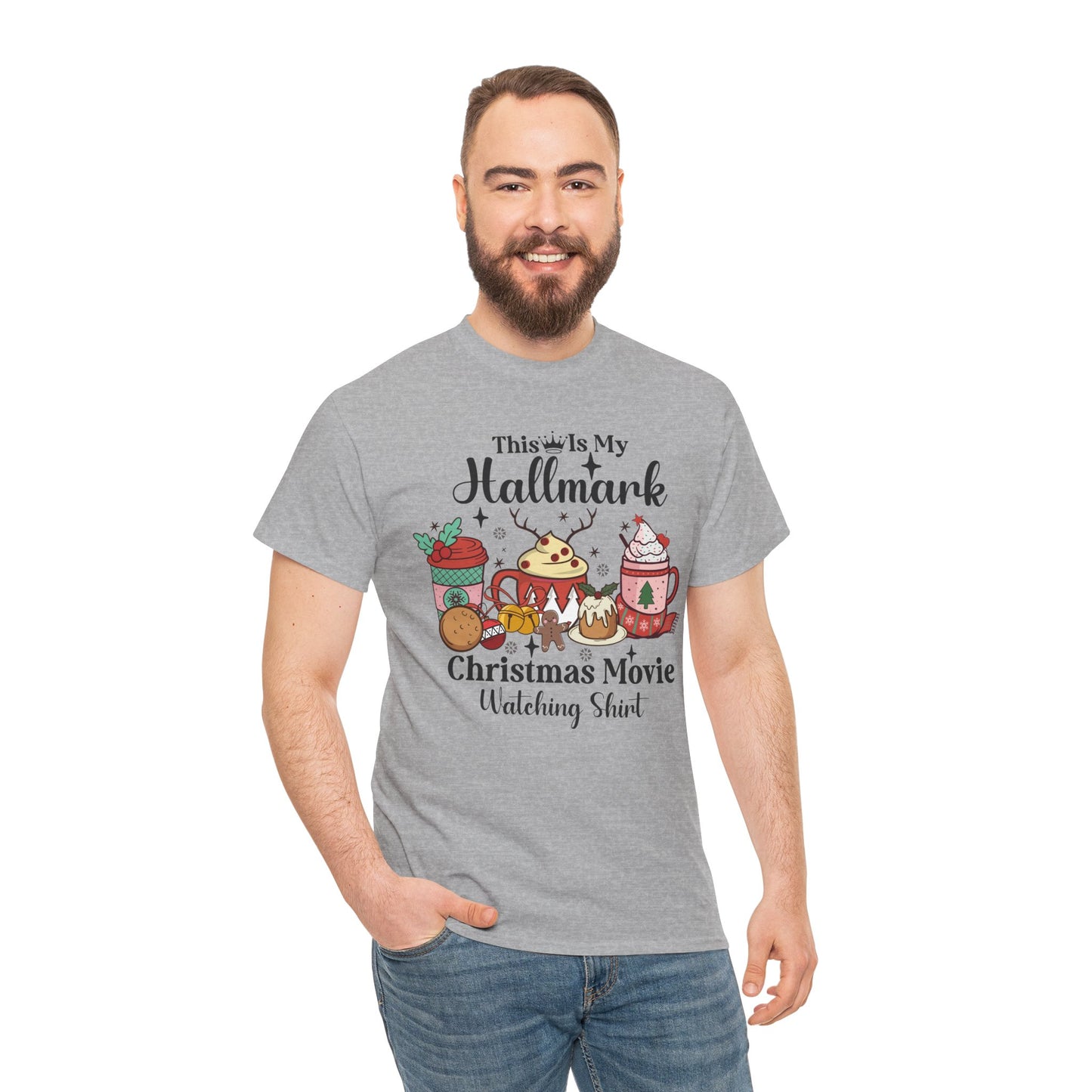 Man wearing a cozy gray Christmas movie watching shirt with festive holiday designs and cheerful text, perfect for celebrations.