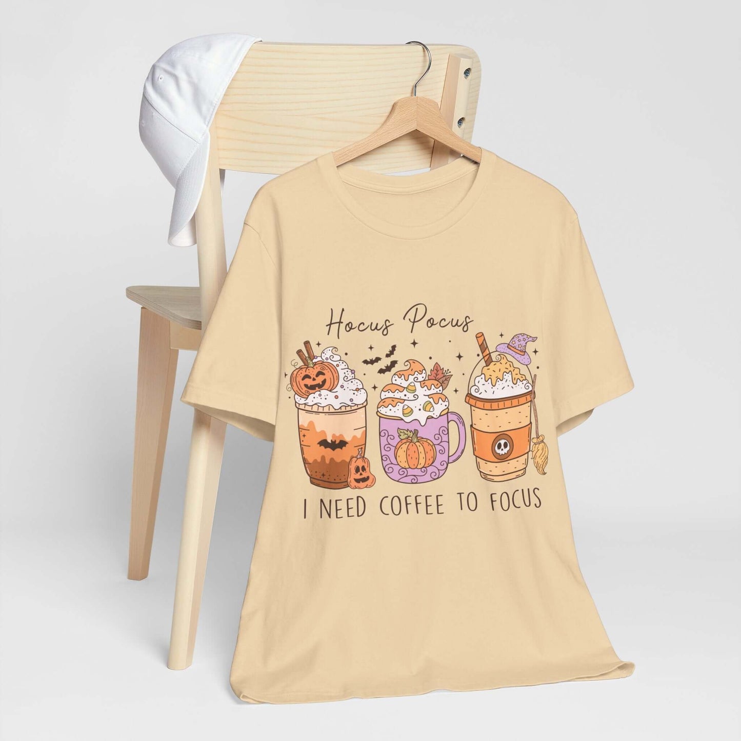 Halloween Coffee Lover's T-shirt, Hocus Pocus I Need Coffee to Focus, Women's Spooky Shirt for Brew-Witching Mornings and Halloween Parties.