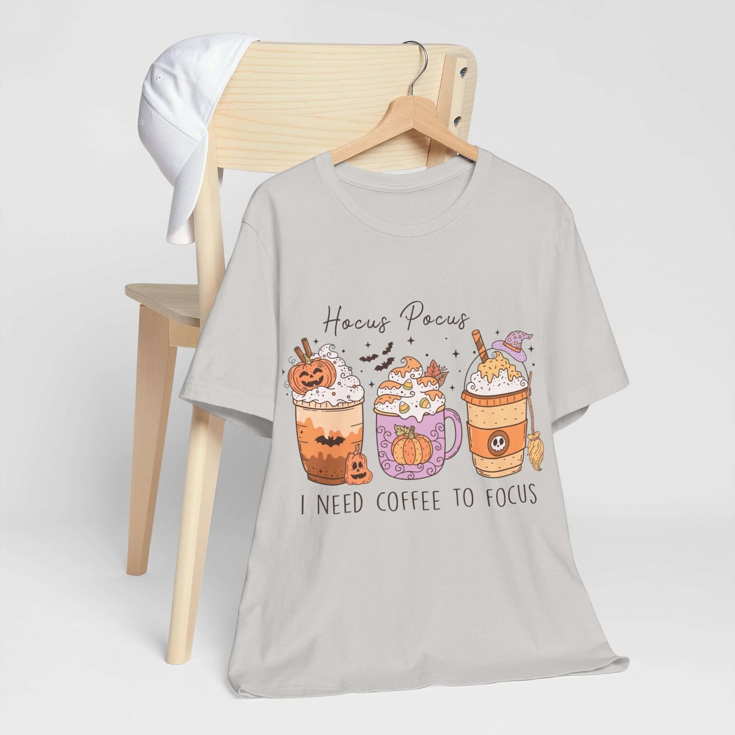 Halloween Coffee Lover's T-shirt, Hocus Pocus I Need Coffee to Focus, Women's Spooky Shirt for Brew-Witching Mornings and Halloween Parties.