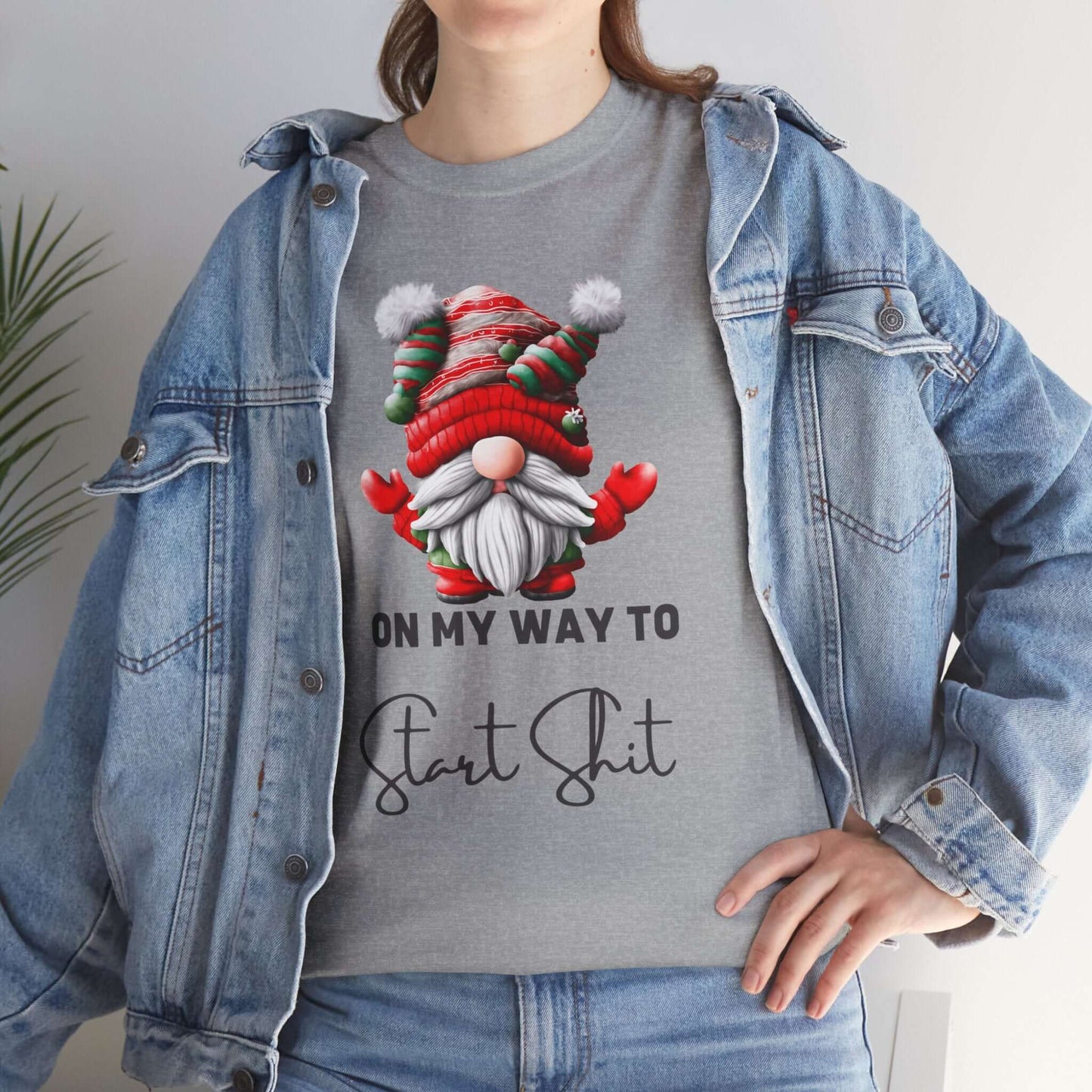 Festive-themed t-shirt with a Santa Claus dressed gnome graphic and humorously the text "On my way Start Shit" at the bottom