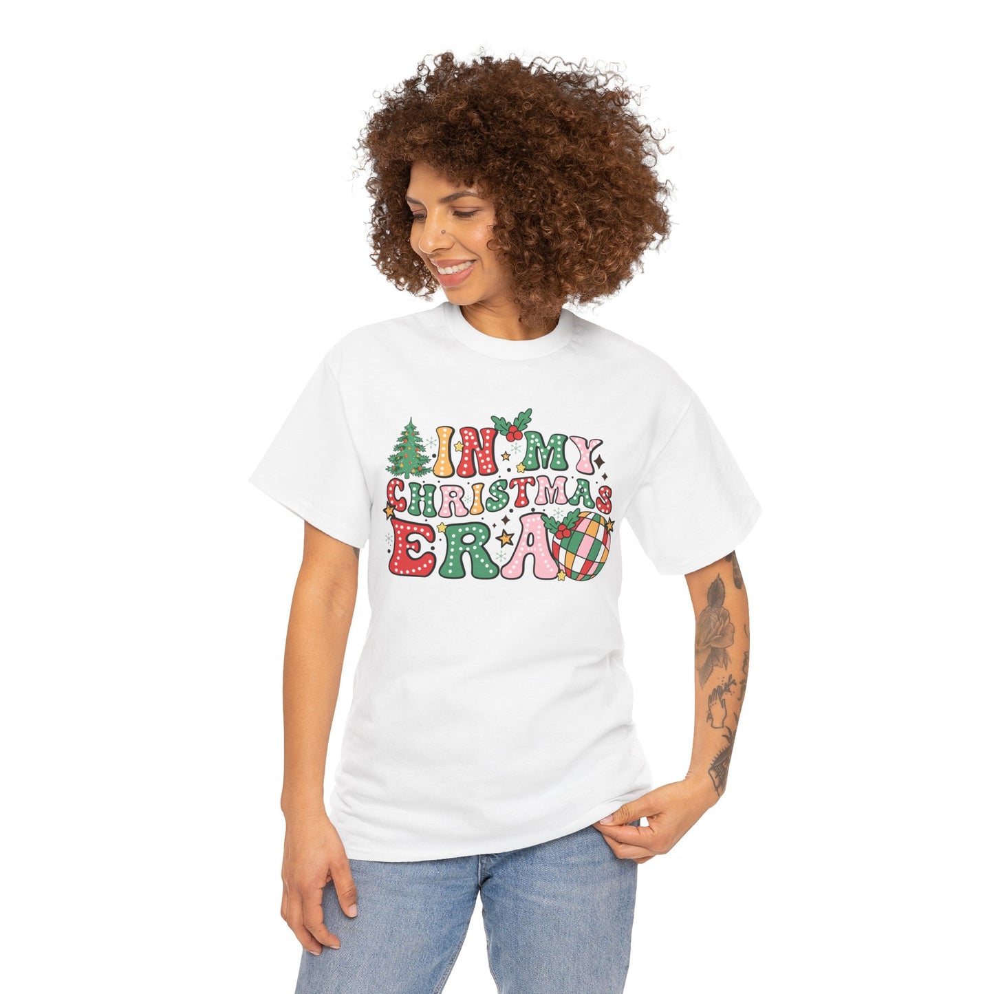 Cheerful unisex t-shirt featuring "In My Christmas Era" design with festive letters and holiday elements like trees and ornaments.