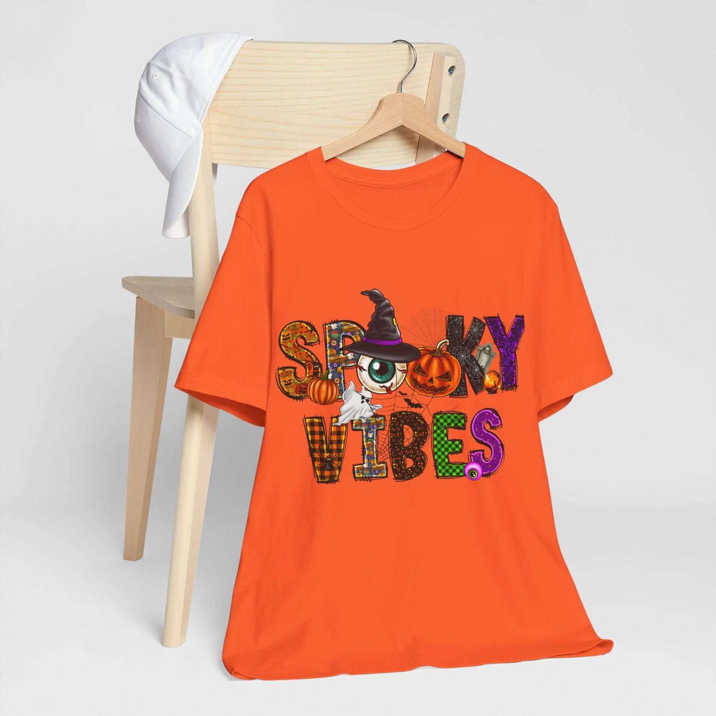 Halloween Vibes Women's T-shirt - Spooky Mischievous Goblins and Fluttering Bats - Cartoon Scary Tee for Halloween Outfits and Tingling Fun.