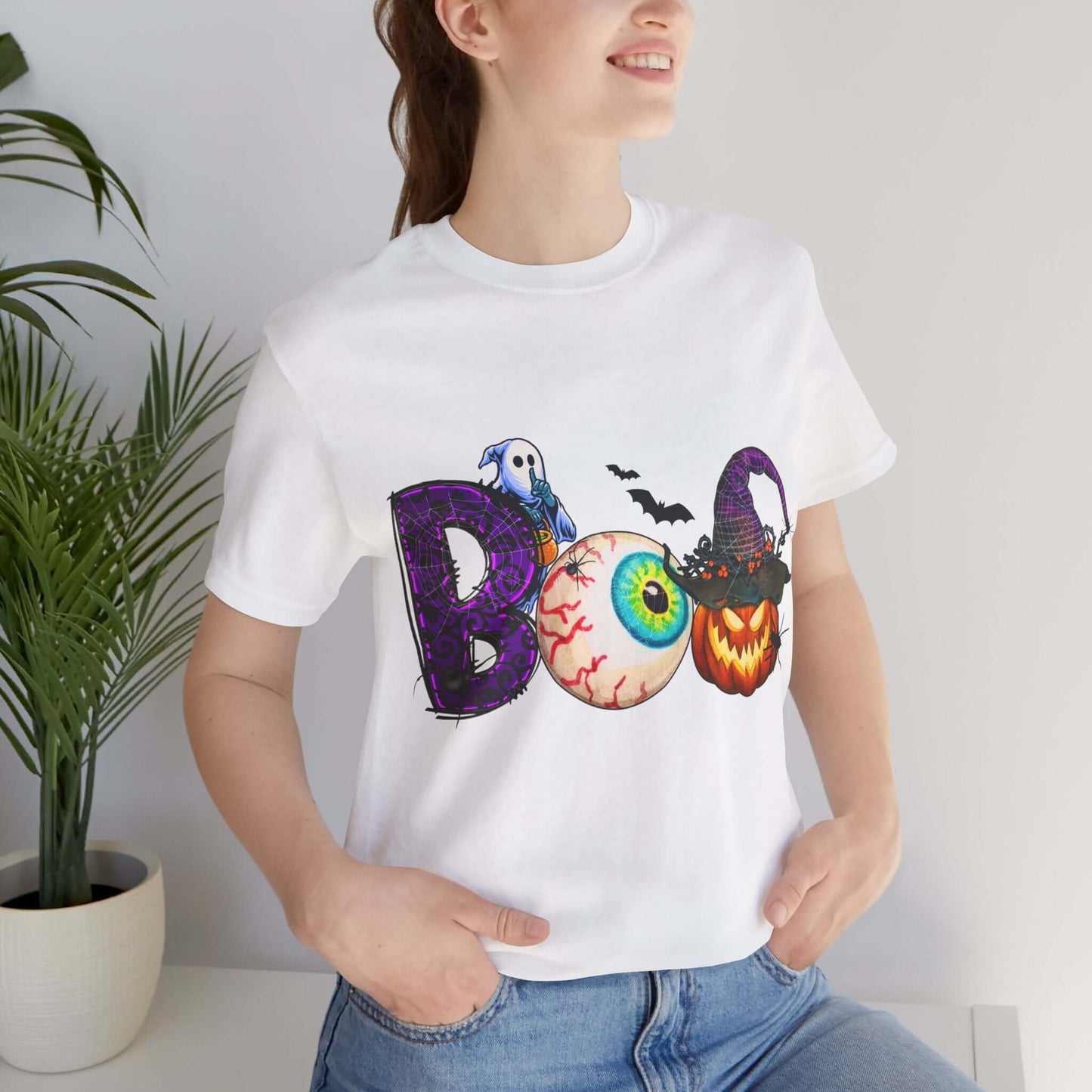 Halloween 'Boo' Women's T-shirt, Spooky Eyeball and Pumpkin Design, Cartoon Scary Tee for Unique Halloween Outfits and Fun Trick-or-Treating