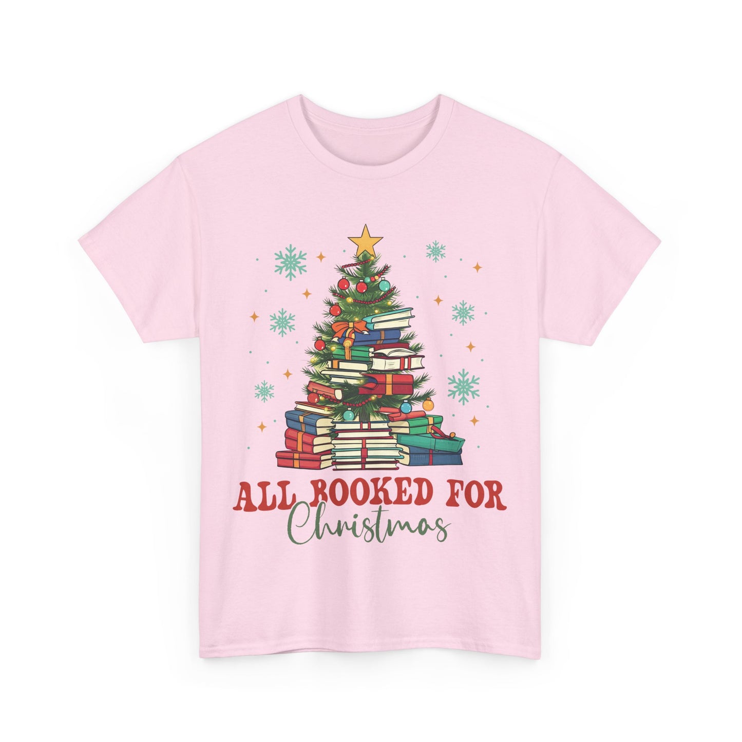 Pink Christmas Book Lover tee featuring a festive design with stacked books and holiday decorations. Perfect for the season!