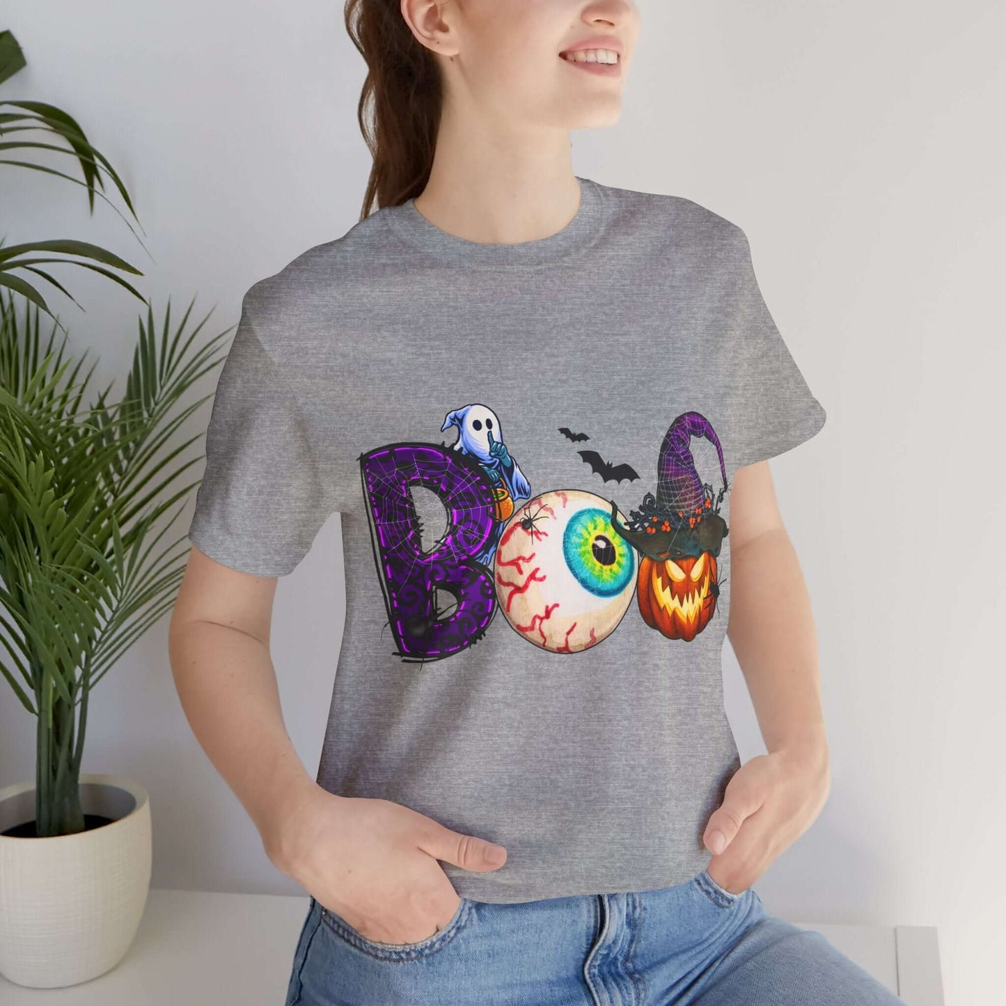 Halloween 'Boo' Women's T-shirt, Spooky Eyeball and Pumpkin Design, Cartoon Scary Tee for Unique Halloween Outfits and Fun Trick-or-Treating