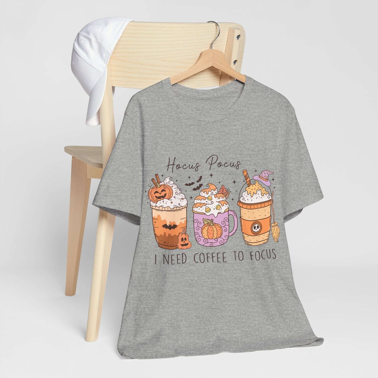 Halloween Coffee Lover's T-shirt, Hocus Pocus I Need Coffee to Focus, Women's Spooky Shirt for Brew-Witching Mornings and Halloween Parties.