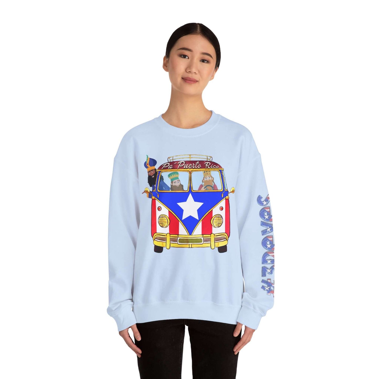 Christmas sweater with VW bus and Puerto Rico flag print, festive design on left sleeve, worn by a person, holiday apparel.