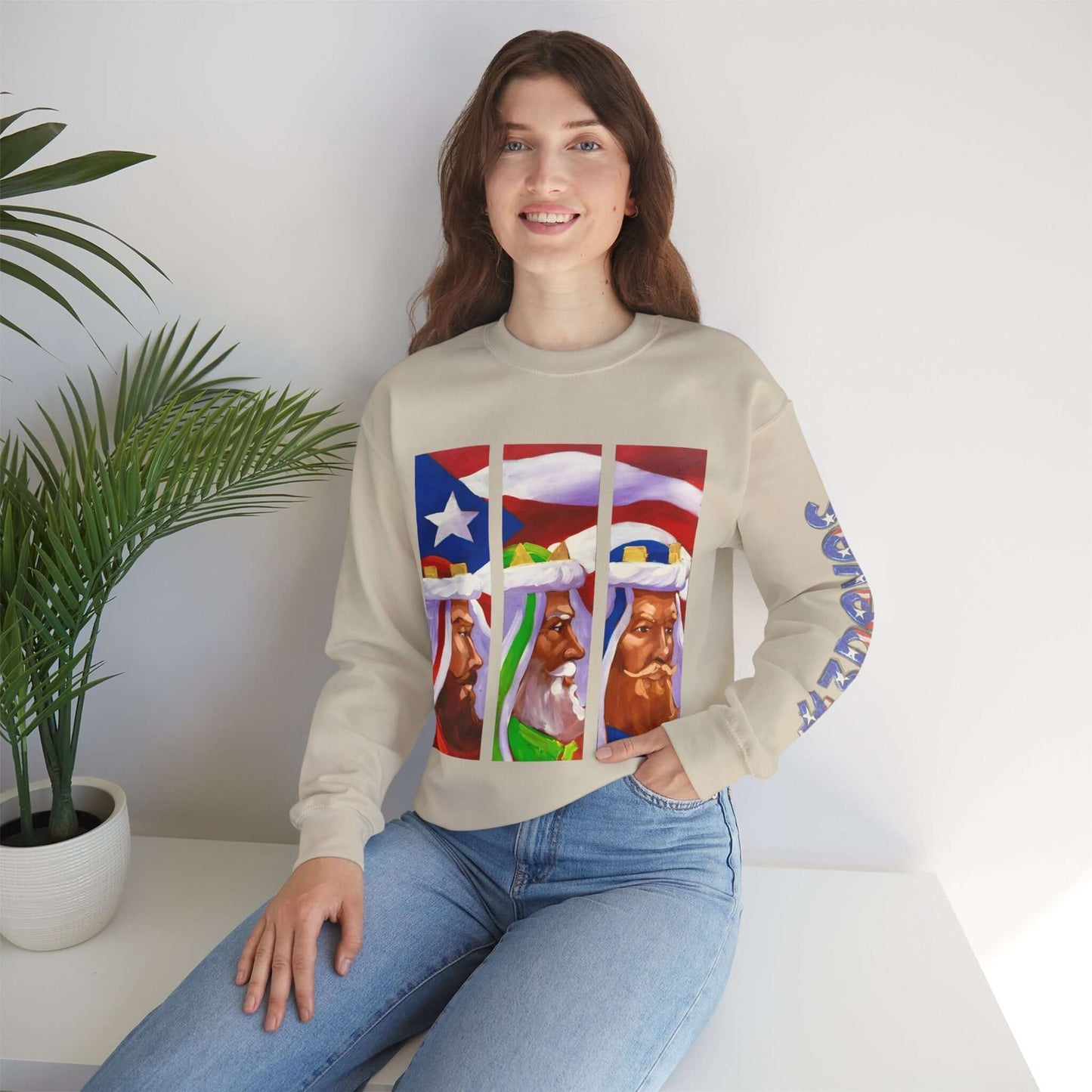 Festive Three Kings holiday sweater with Puerto Rican flag and artistic print, cream-colored cozy design worn by smiling woman.