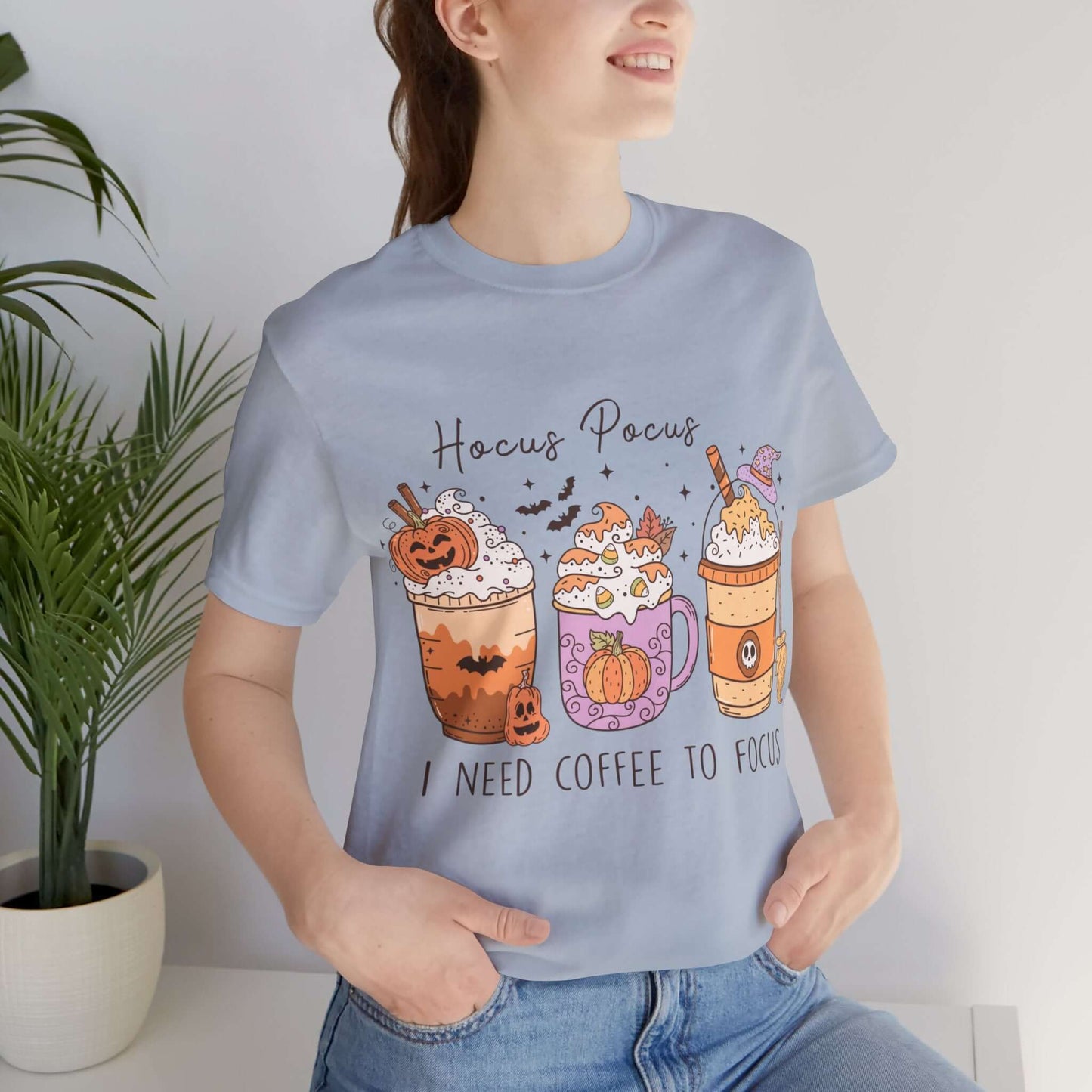 Halloween Coffee Lover's T-shirt, Hocus Pocus I Need Coffee to Focus, Women's Spooky Shirt for Brew-Witching Mornings and Halloween Parties.