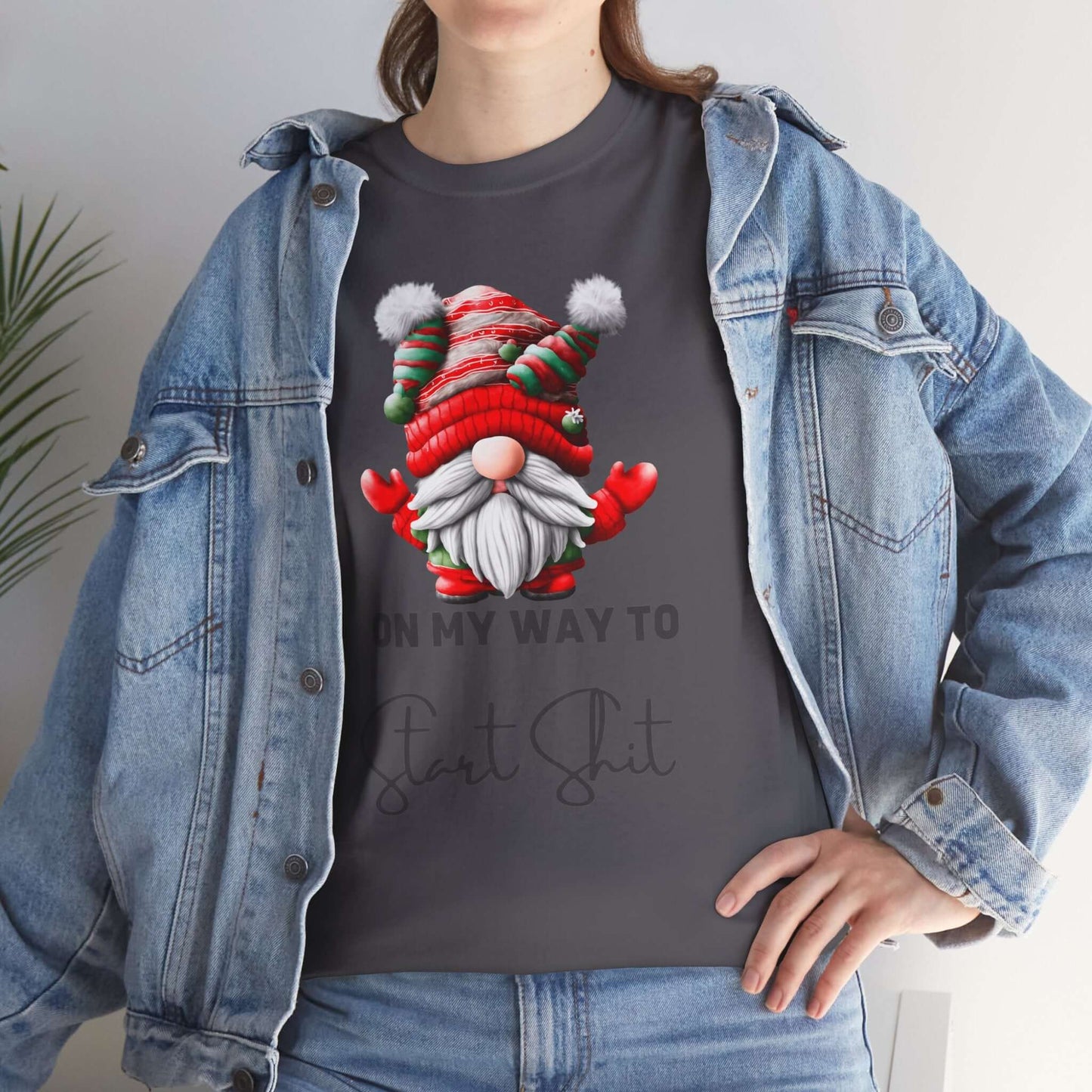 Festive-themed t-shirt with a Santa Claus dressed gnome graphic and humorously the text "On my way Start Shit" at the bottom