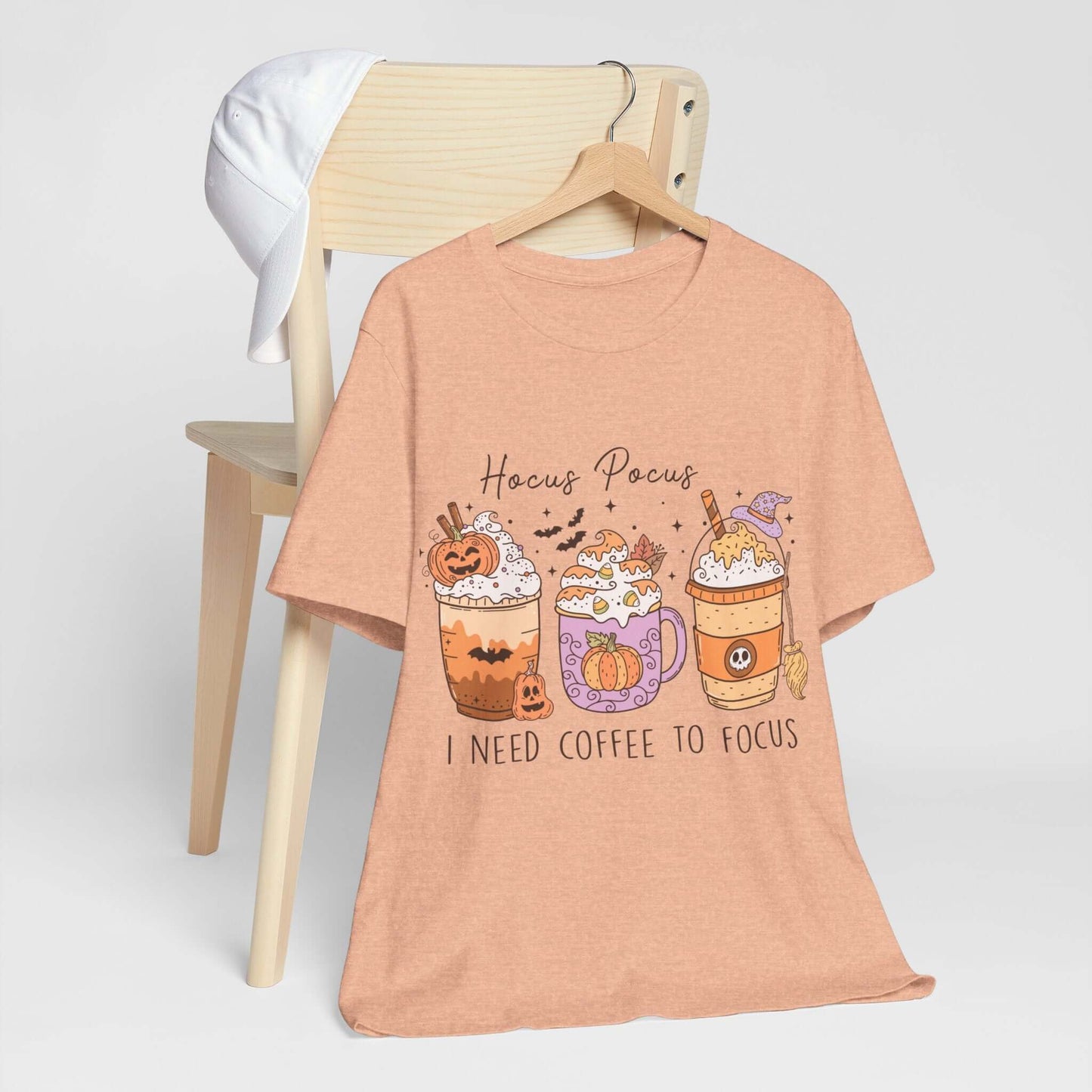 Halloween Coffee Lover's T-shirt, Hocus Pocus I Need Coffee to Focus, Women's Spooky Shirt for Brew-Witching Mornings and Halloween Parties.