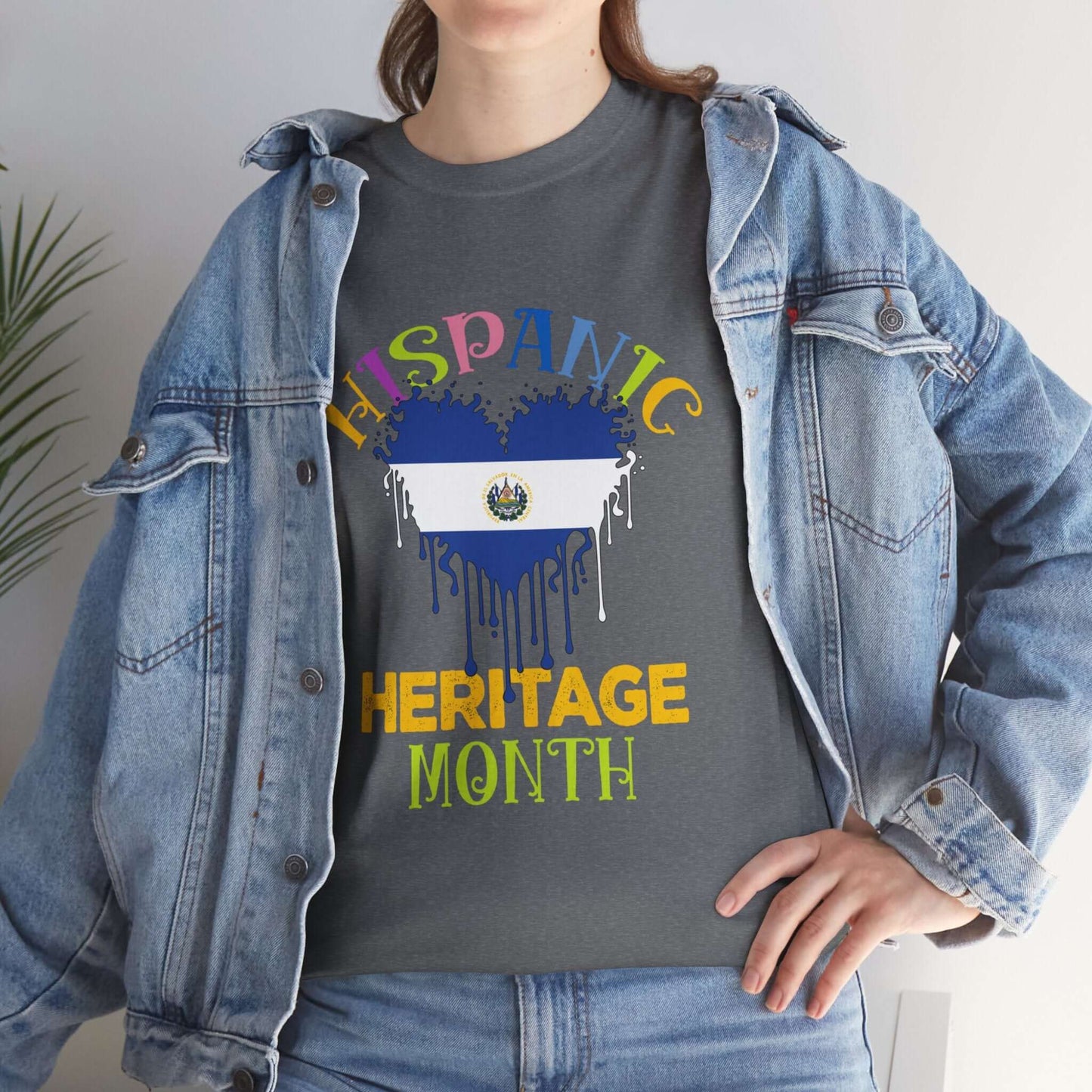 Hispanic Heritage Month Salvadorian Heart Flag Graphic Tee on person wearing denim jacket