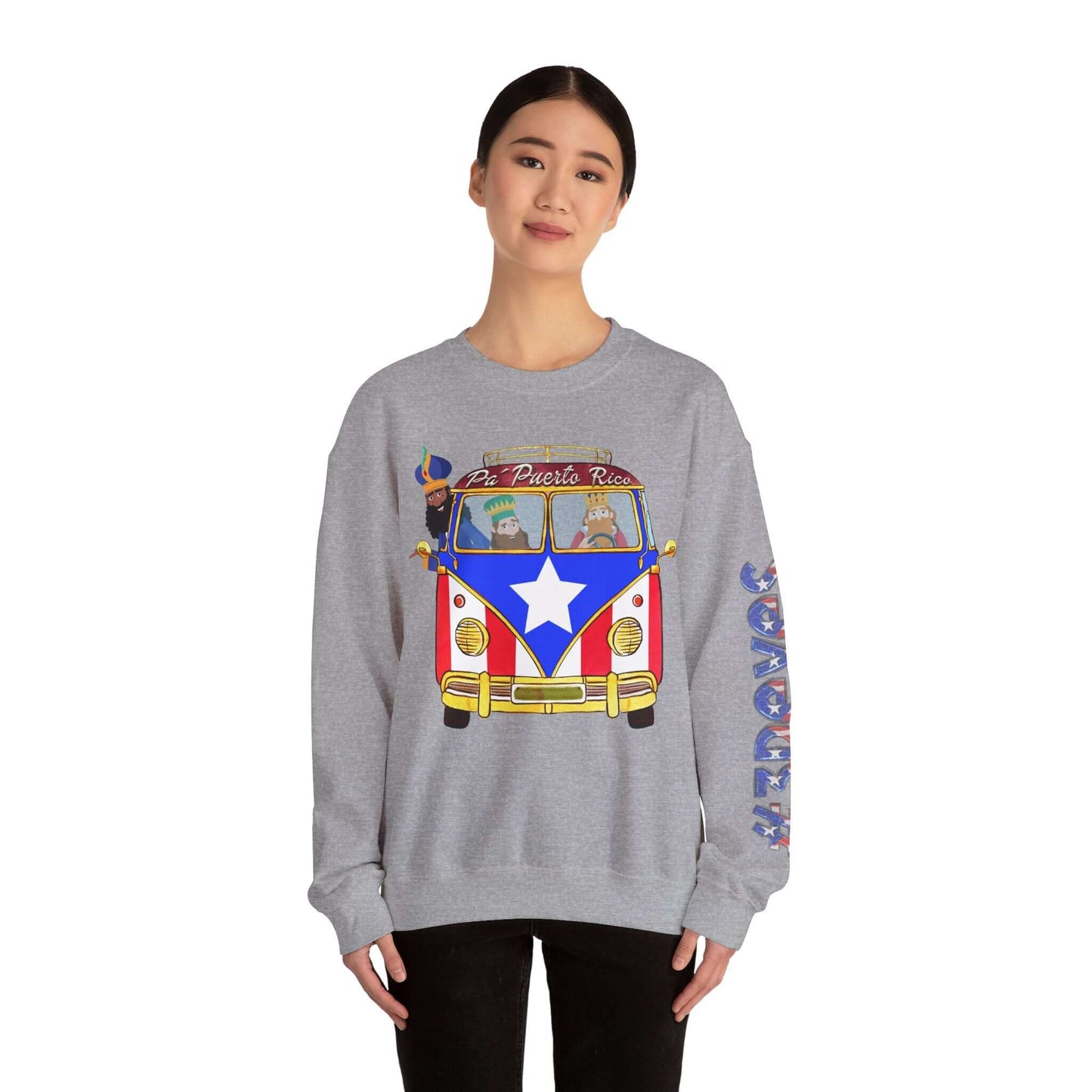 Woman wearing festive Christmas sweater with VW bus and Puerto Rico flag print, vibrant left sleeve design, holiday fashion.