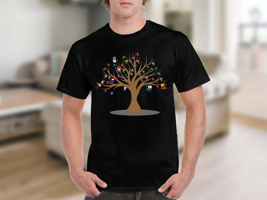 Man wearing black t-shirt with colorful handprint tree design. Stylish graphic tee perfect for art lovers and creativity expression.