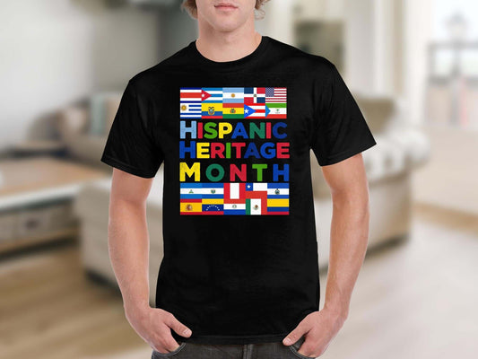 Man wearing a vibrant Hispanic Heritage Month T-shirt featuring colorful flags and text, celebrating rich Hispanic cultures.